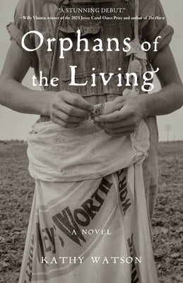 Paperback copy of "Orphans of the Living" by She Writes Press, showing the book cover with title and author.