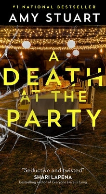 Mass market paperback of "A Death at the Party" by Simon & Schuster, showing the book cover with title and author details.