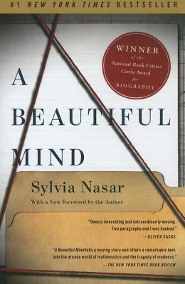 Paperback of "A Beautiful Mind" by Simon & Schuster, featuring the book cover with images of John Nash and mathematical themes.