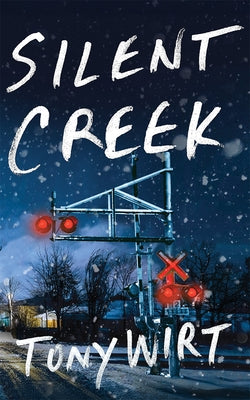 Paperback of Silent Creek novel by Thomas & Mercer featuring a minimalist cover design with a serene creek scene.