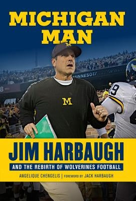Hardcover book titled "Michigan Man: Jim Harbaugh and the Rebirth of Wolverines Football" by Triumph Books, featuring a Michigan Wolverines logo.