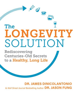 Paperback book titled "The Longevity Solution" by Victory Belt Publishing, featuring a cover with ancient health secrets.