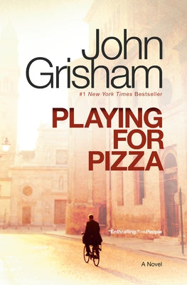Vintage paperback of Playing for Pizza by Vintage, showing the book cover with title and author text.