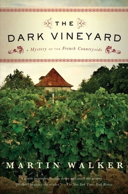 Vintage paperback of The Dark Vineyard, a mystery novel set in the French countryside, featuring a dark vineyard scene on the cover.