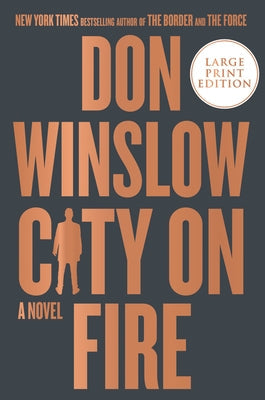 Large print paperback of "City on Fire" by William Morrow, showing the book cover with fiery cityscape artwork.