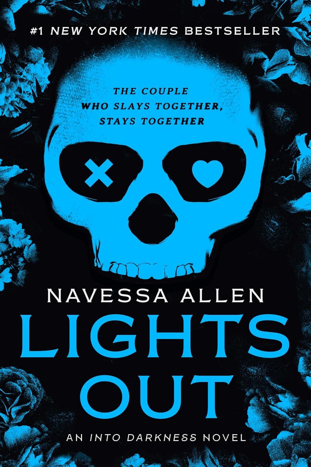 Paperback copy of "Lights Out: An Into Darkness Novel" by Zando - Slowburn, with dark-themed cover art.
